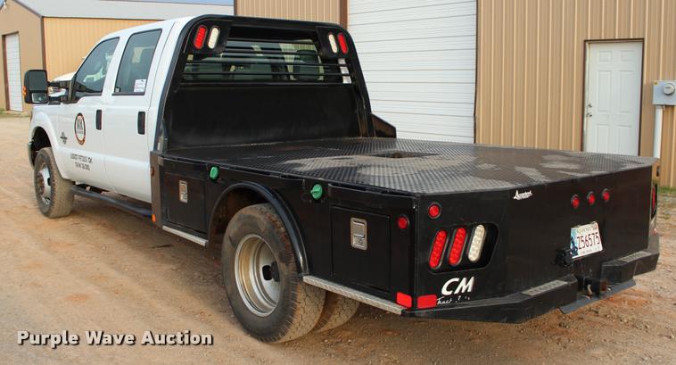 image for item L4956 2014 Ford F350 Super Duty CrewCab flatbed pickup truck