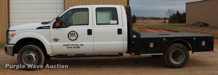 image for item L4956 2014 Ford F350 Super Duty CrewCab flatbed pickup truck