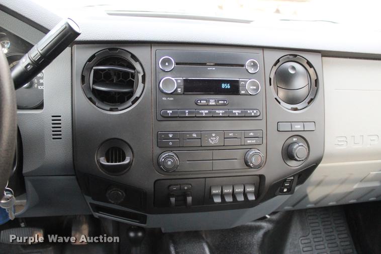 image for item L4956 2014 Ford F350 Super Duty CrewCab flatbed pickup truck