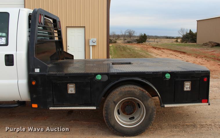 image for item L4956 2014 Ford F350 Super Duty CrewCab flatbed pickup truck