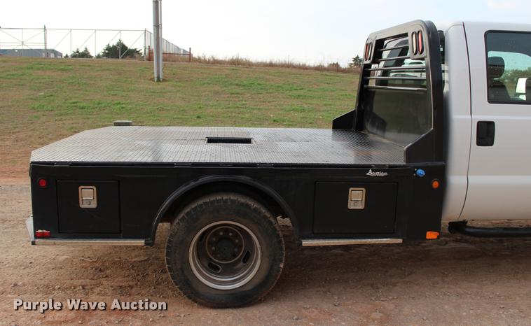 image for item L4956 2014 Ford F350 Super Duty CrewCab flatbed pickup truck