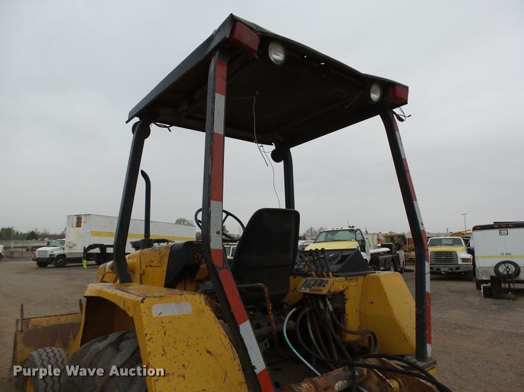 image for item DB0144 1986 John Deere 210C landscape tractor