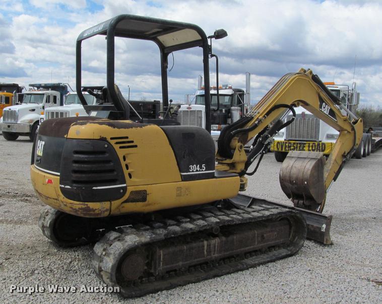 image for item K4945 2002 Caterpillar 304.5 compact excavator