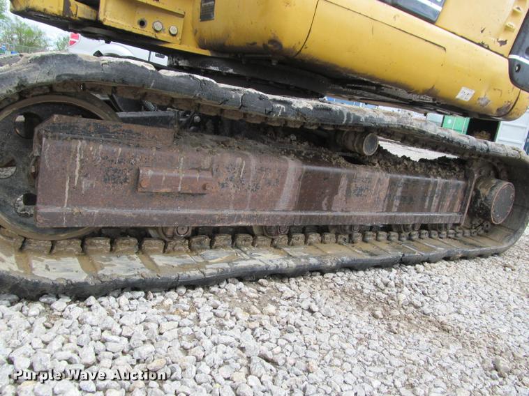 image for item K4945 2002 Caterpillar 304.5 compact excavator