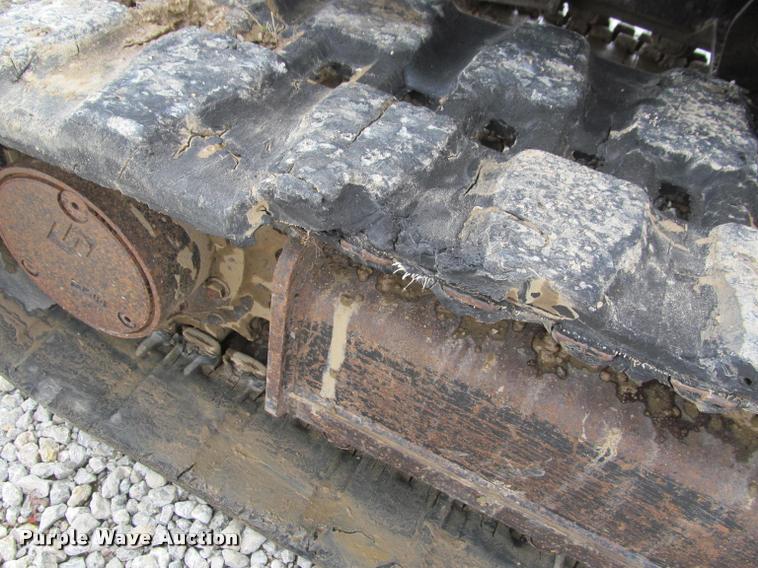 image for item K4945 2002 Caterpillar 304.5 compact excavator