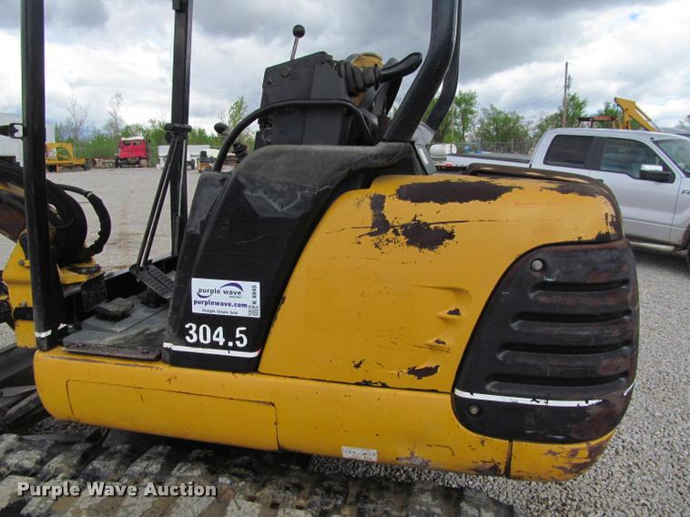 image for item K4945 2002 Caterpillar 304.5 compact excavator