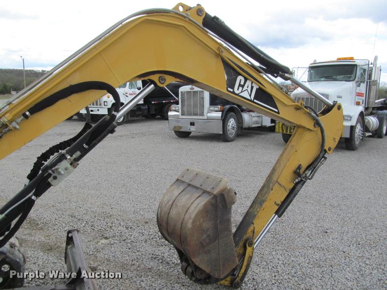 image for item K4945 2002 Caterpillar 304.5 compact excavator
