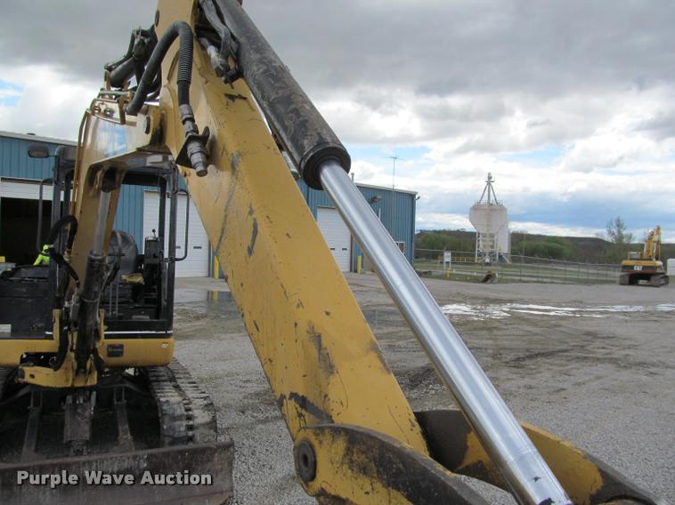 image for item K4945 2002 Caterpillar 304.5 compact excavator