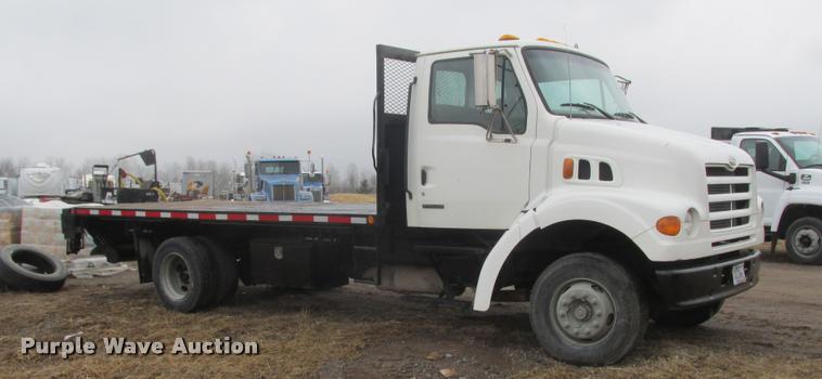 image for item K6157 1999 Sterling L7501 flatbed truck