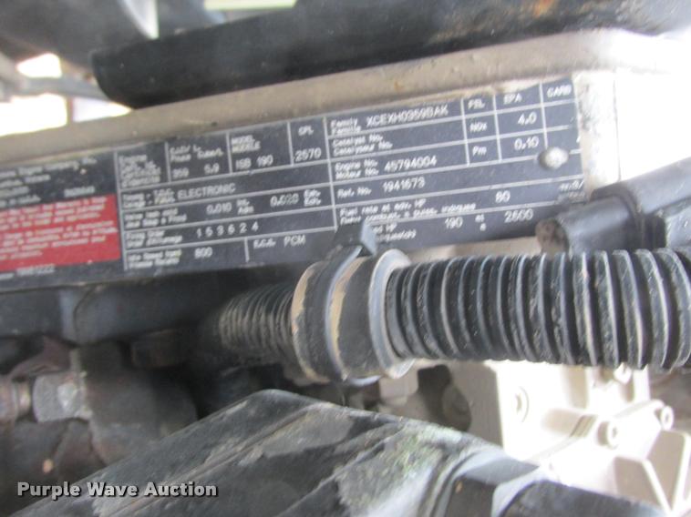 image for item K6157 1999 Sterling L7501 flatbed truck