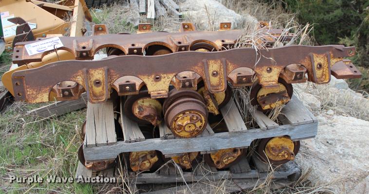 image for item L4958 John Deere 850C dozer rollers and rock guards