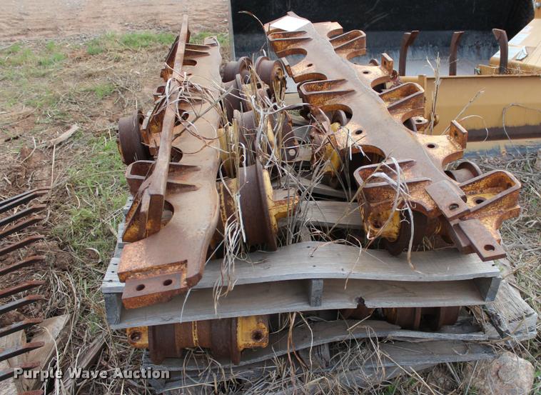 image for item L4958 John Deere 850C dozer rollers and rock guards