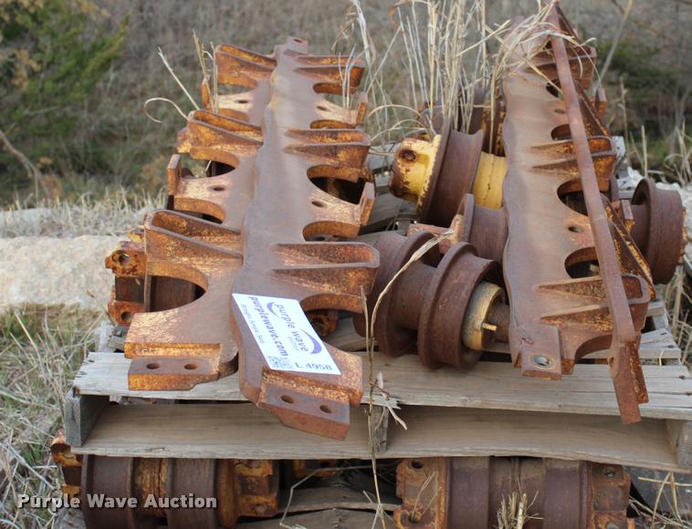 image for item L4958 John Deere 850C dozer rollers and rock guards