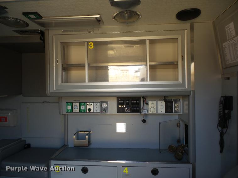 image for item BH9307 2001 Freightliner FL60 ambulance