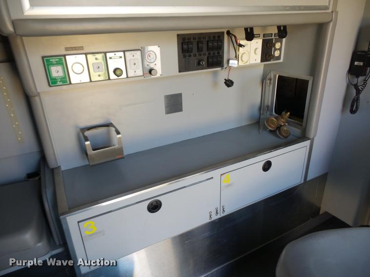 image for item BH9307 2001 Freightliner FL60 ambulance