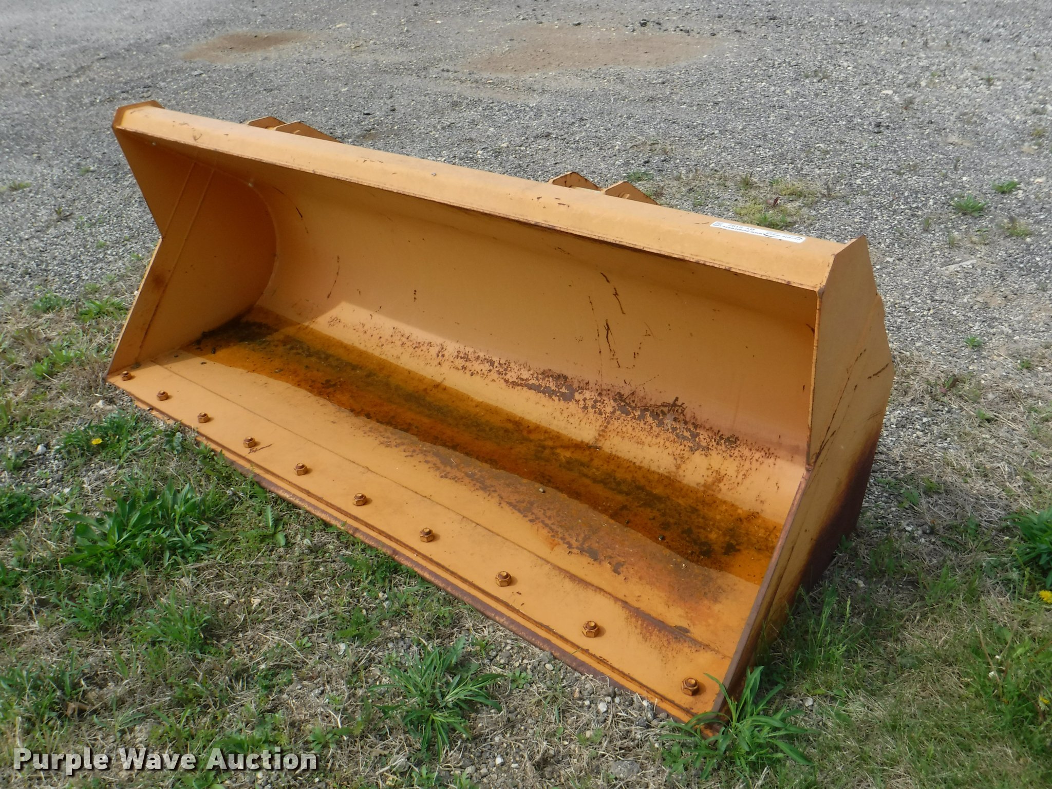 Case loader bucket in Louisburg, KS Item BY9192 sold Purple Wave