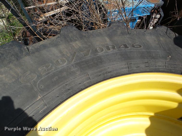 image for item DA1898 (4) Firestone Super Traction 620/70R46 tires and wheels