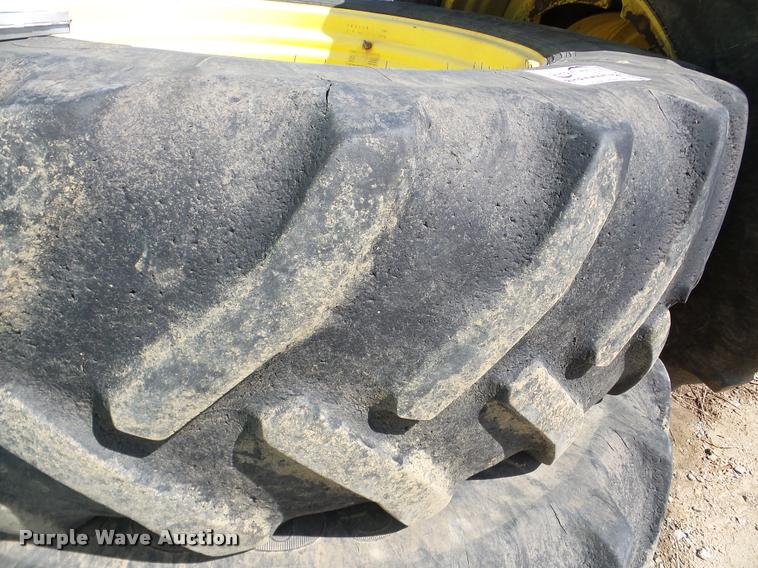 image for item DA1898 (4) Firestone Super Traction 620/70R46 tires and wheels