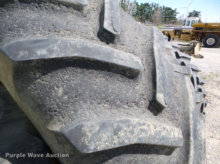 image for item DA1898 (4) Firestone Super Traction 620/70R46 tires and wheels