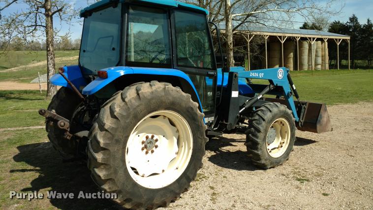 image for item F1842 1999 New Holland 6635 tractor