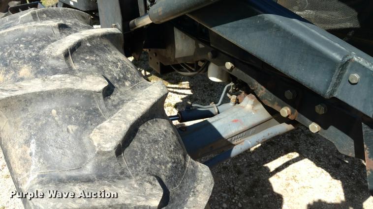 image for item F1842 1999 New Holland 6635 tractor