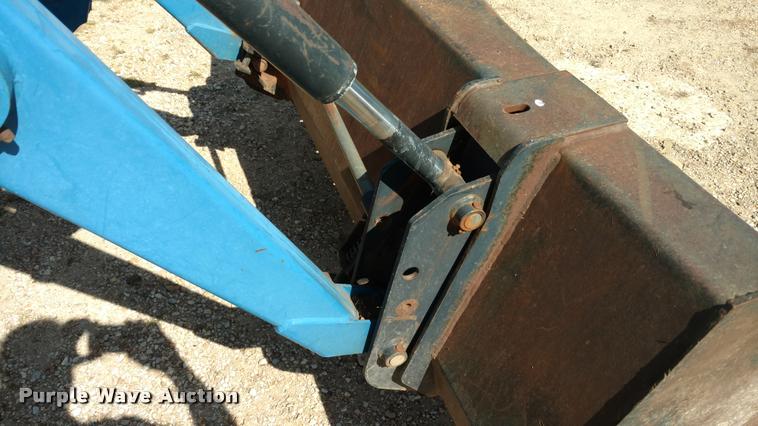 image for item F1842 1999 New Holland 6635 tractor