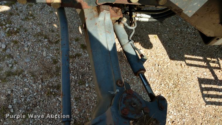 image for item F1842 1999 New Holland 6635 tractor