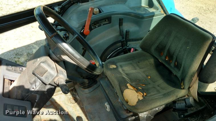 image for item F1842 1999 New Holland 6635 tractor