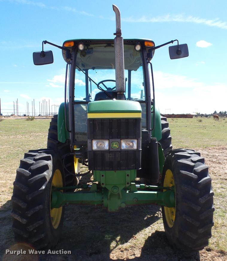 image for item L1555 2008 John Deere 6403 MFWD tractor