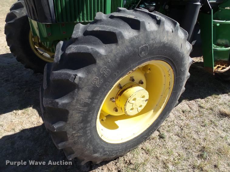 image for item L1555 2008 John Deere 6403 MFWD tractor