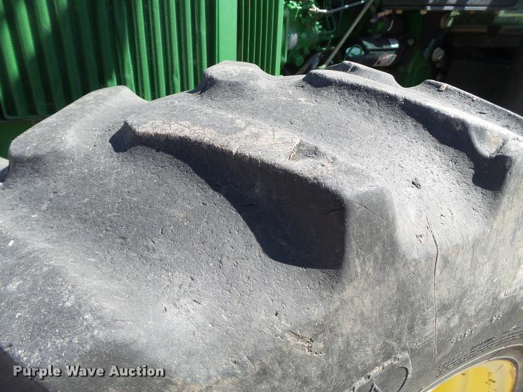 image for item L1555 2008 John Deere 6403 MFWD tractor