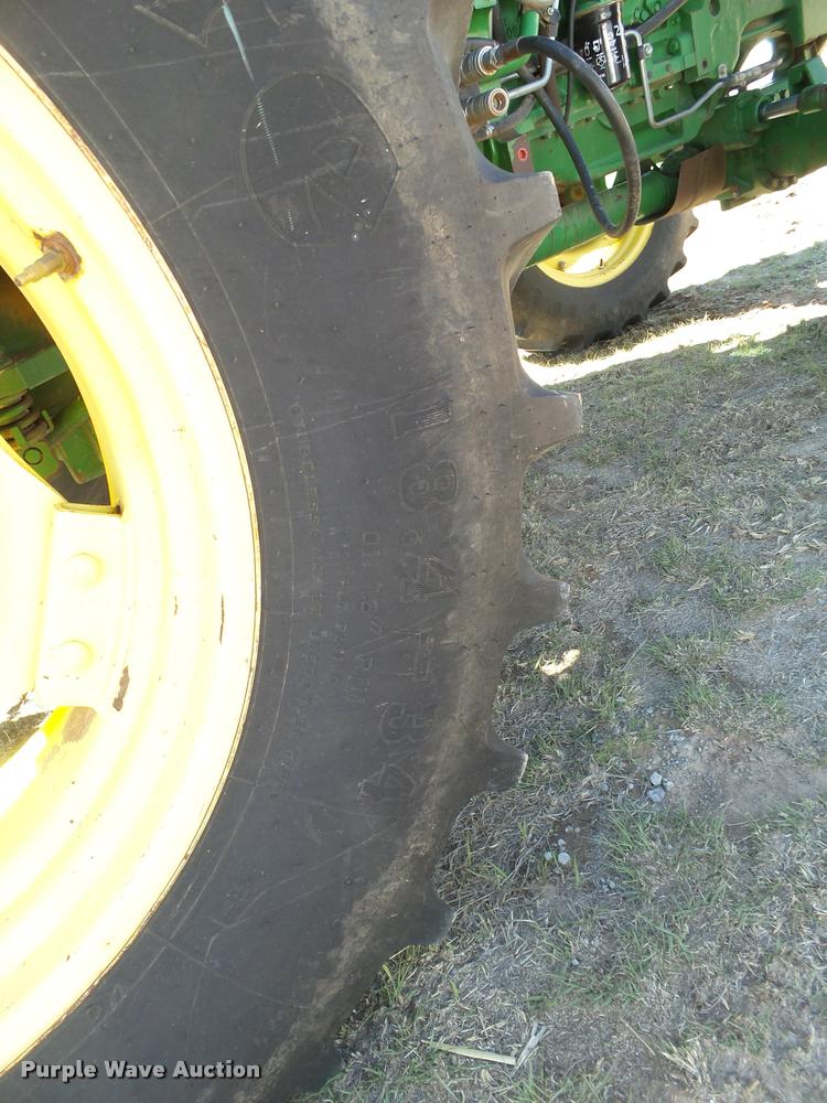 image for item L1555 2008 John Deere 6403 MFWD tractor