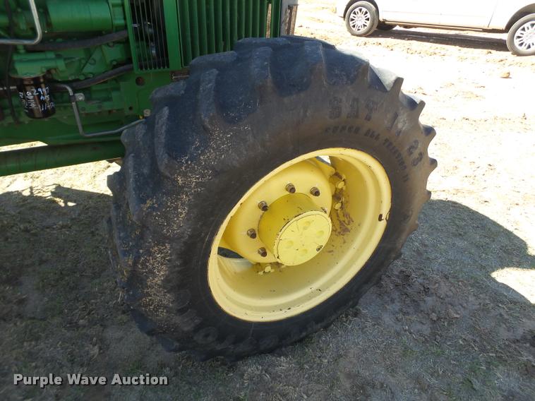 image for item L1555 2008 John Deere 6403 MFWD tractor