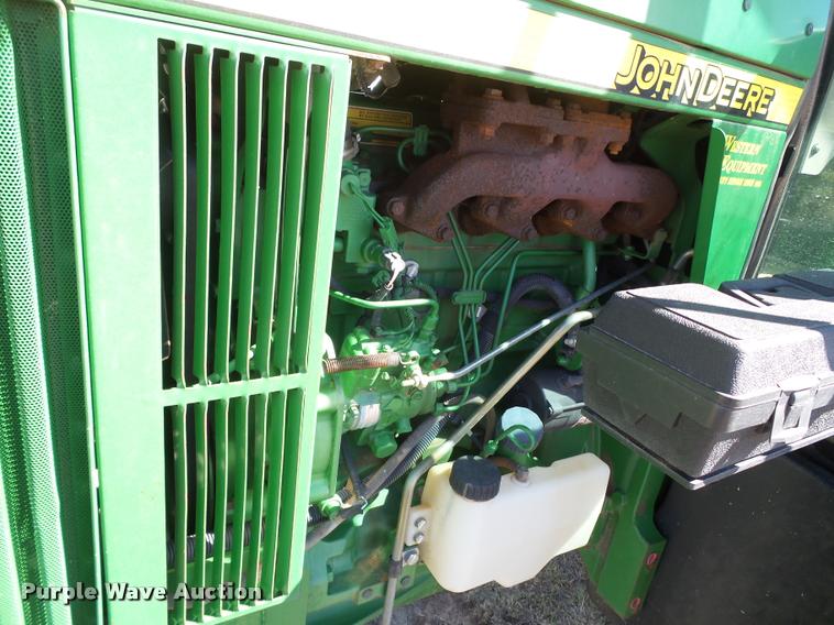 image for item L1555 2008 John Deere 6403 MFWD tractor