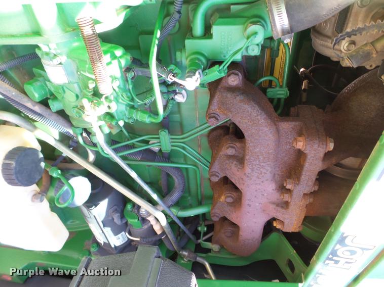 image for item L1555 2008 John Deere 6403 MFWD tractor