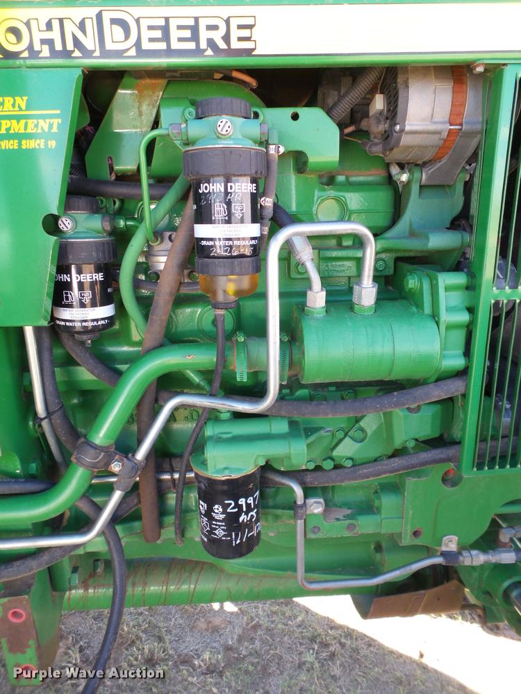 image for item L1555 2008 John Deere 6403 MFWD tractor