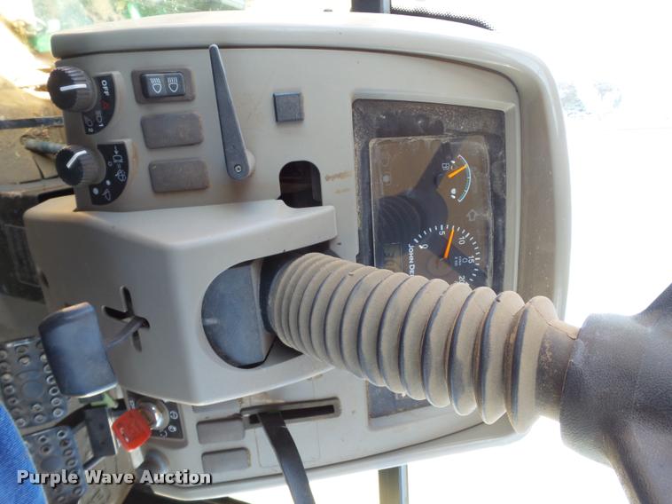 image for item L1555 2008 John Deere 6403 MFWD tractor