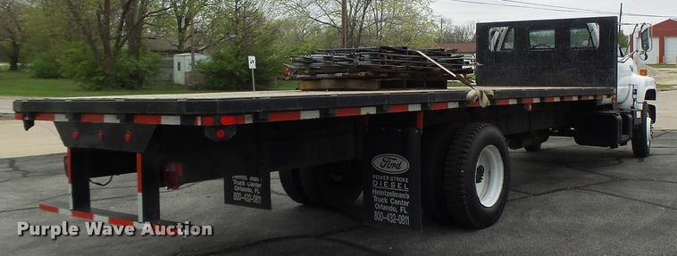 image for item DB1304 1994 GMC TopKick flatbed truck