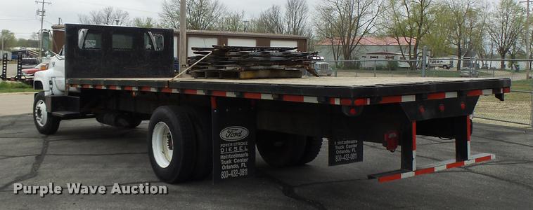 image for item DB1304 1994 GMC TopKick flatbed truck
