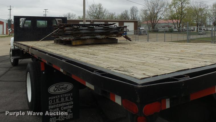 image for item DB1304 1994 GMC TopKick flatbed truck