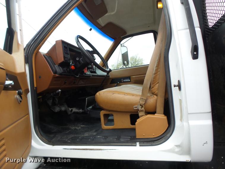 image for item DB1304 1994 GMC TopKick flatbed truck