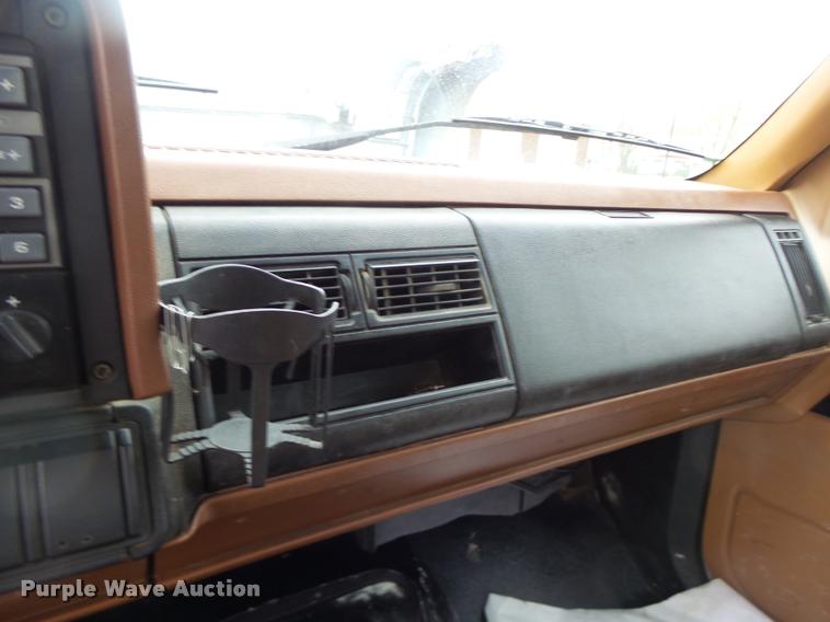 image for item DB1304 1994 GMC TopKick flatbed truck