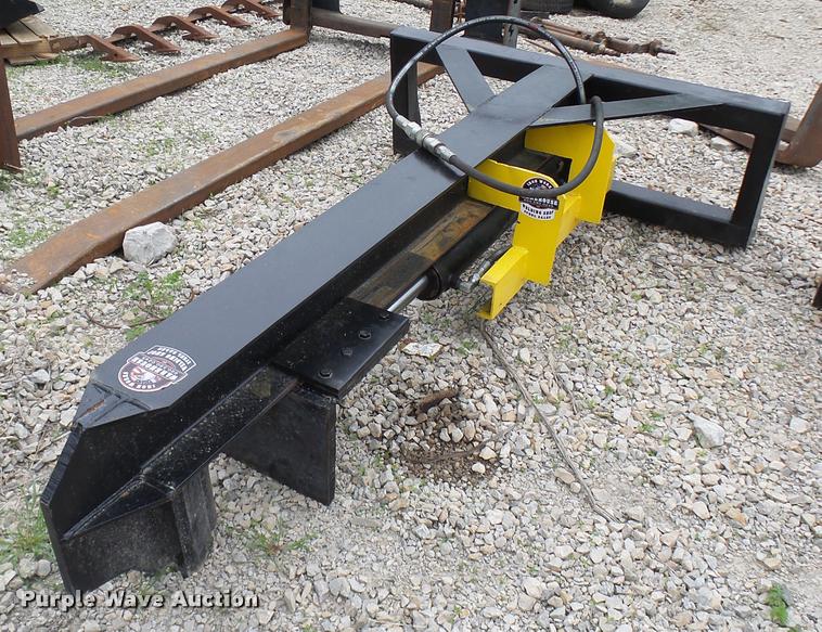 Warehouse Iron Works inverted skid steer log splitter in Centerview, MO