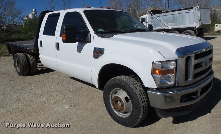 image for item DA3445 2010 Ford F350 Super Duty Crew Cab flatbed pickup truck