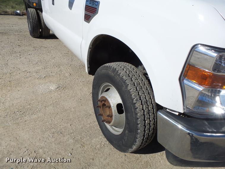 image for item DA3445 2010 Ford F350 Super Duty Crew Cab flatbed pickup truck