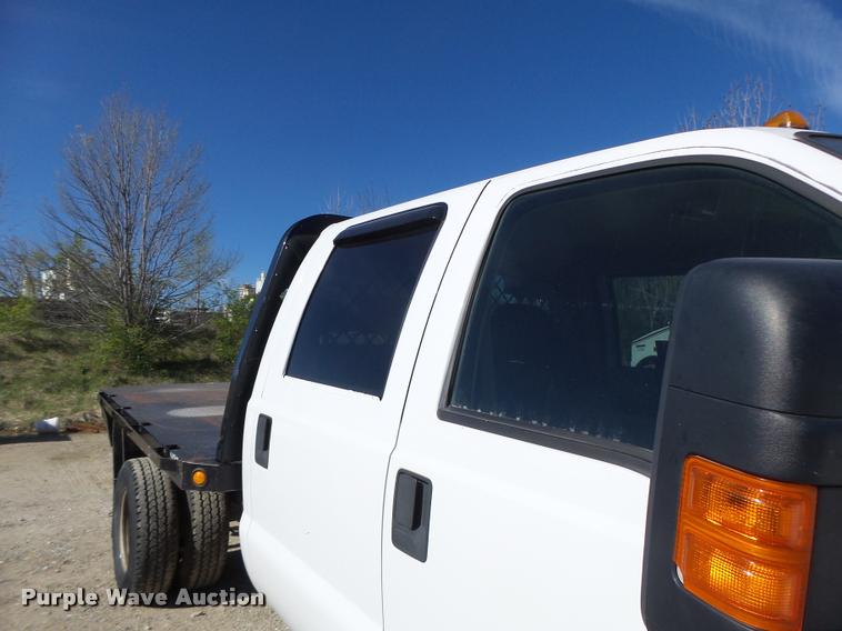 image for item DA3445 2010 Ford F350 Super Duty Crew Cab flatbed pickup truck