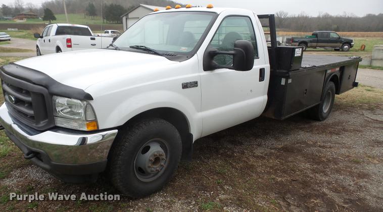 image for item DB0603 2004 Ford F350 Super Duty flatbed pickup truck