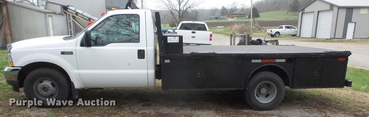 image for item DB0603 2004 Ford F350 Super Duty flatbed pickup truck