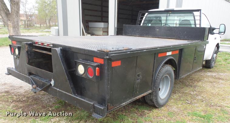 image for item DB0603 2004 Ford F350 Super Duty flatbed pickup truck
