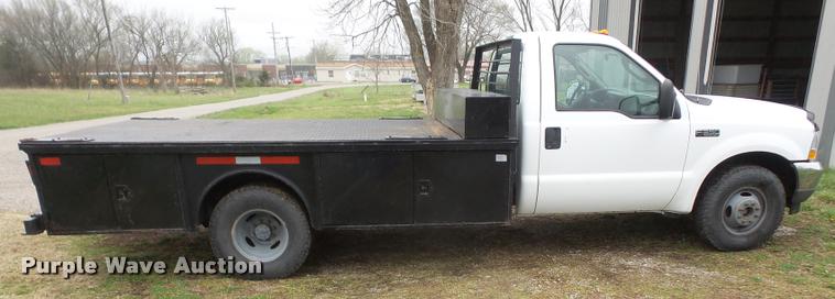 image for item DB0603 2004 Ford F350 Super Duty flatbed pickup truck